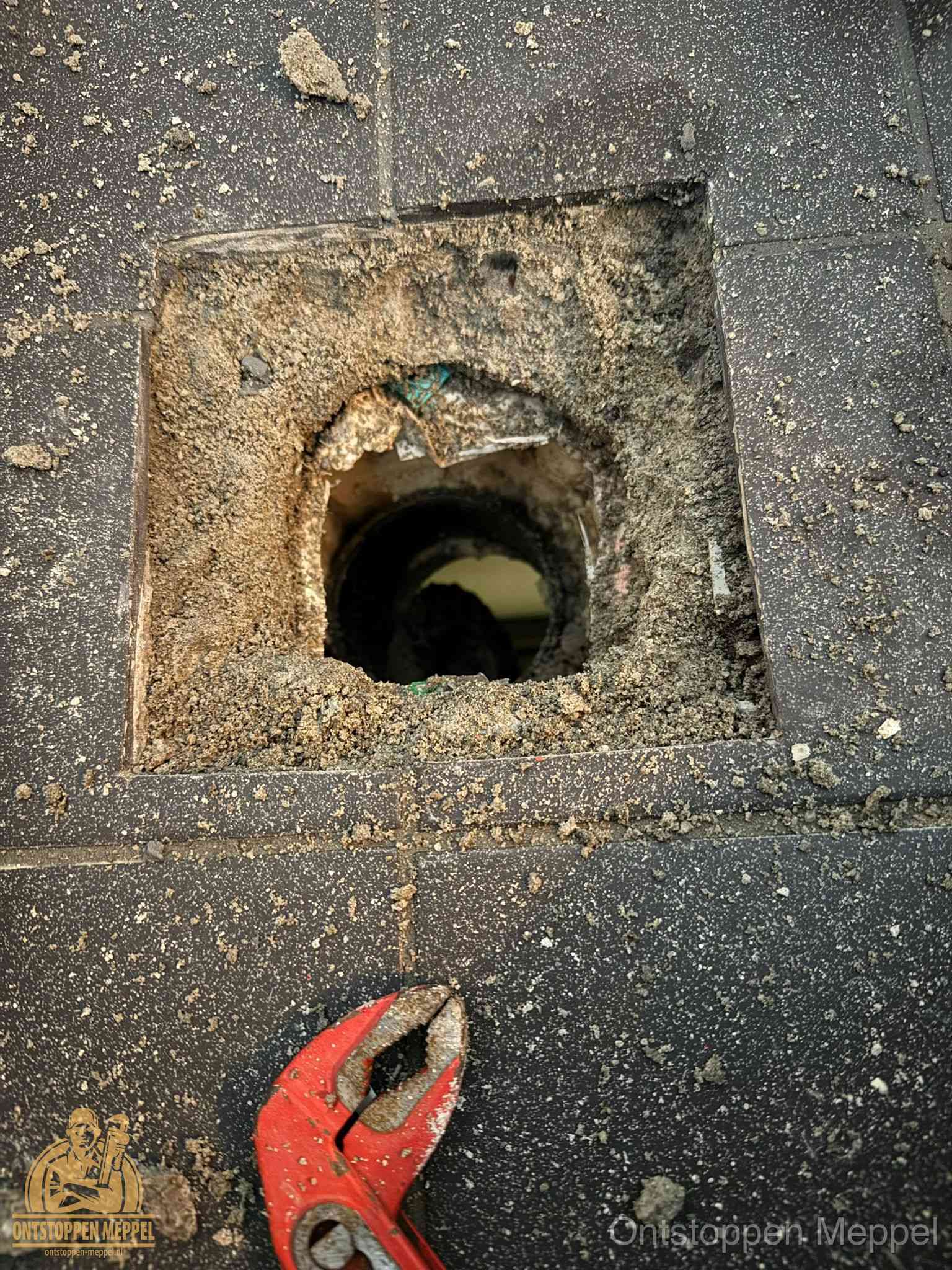 Rioolputje erfgrens eigendom in Meppel